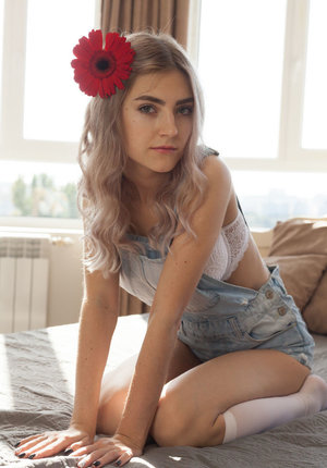 1 dark haired female tortures another during lezdom play in concrete cellar